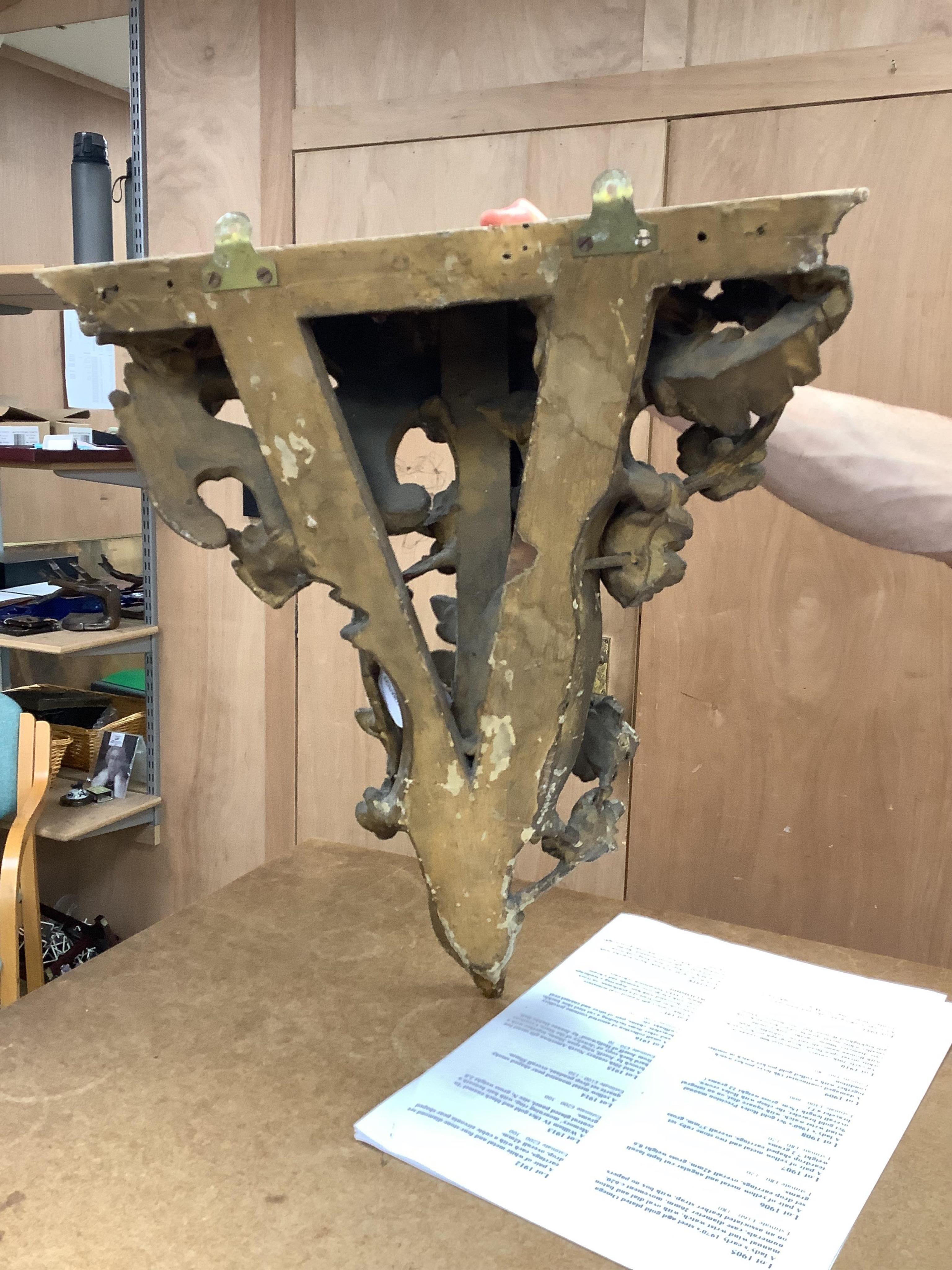 A Rococo style gilt wall bracket, 43cm high